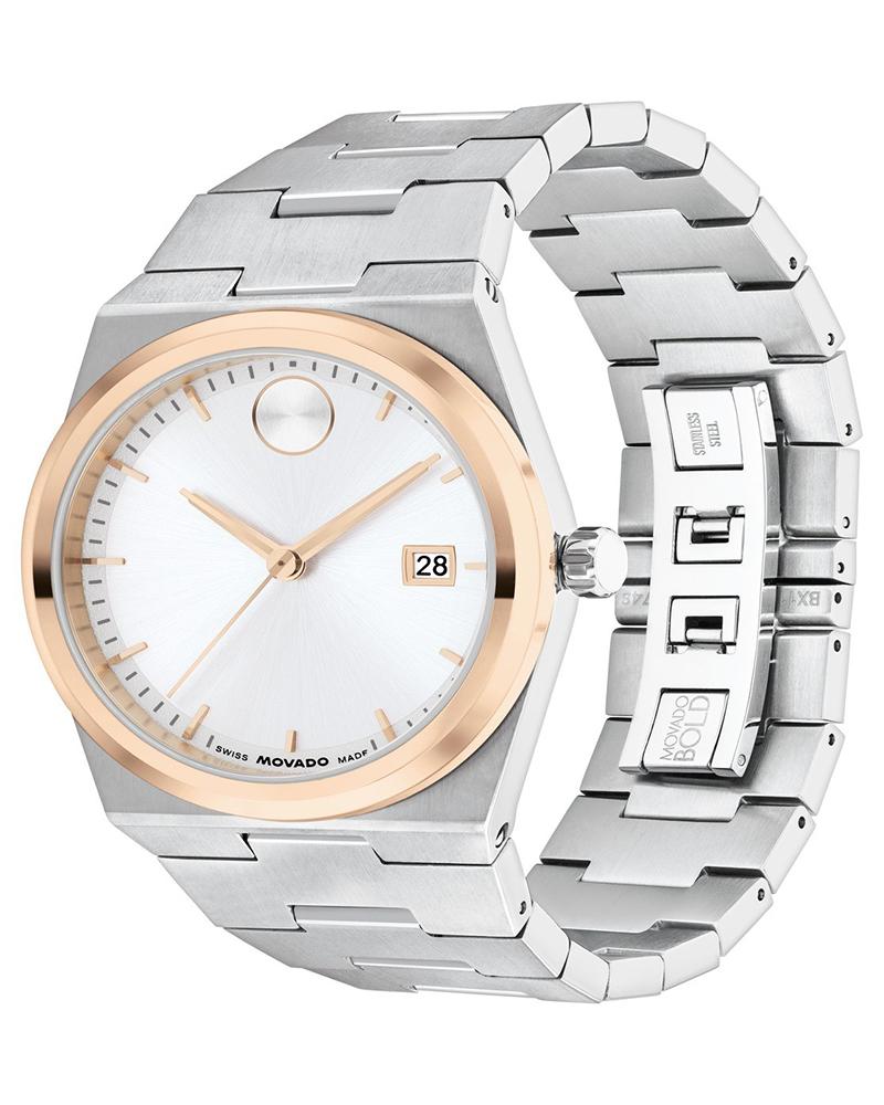 Movado BOLD Quest two-tone watch with white dial, date window, and stainless steel bracelet