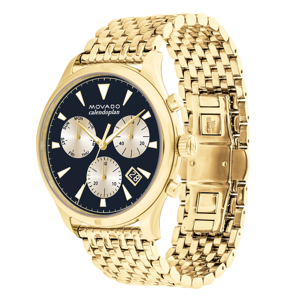 Movado Heritage chronograph watch at angle showing black dial and gold tone metal bracelet