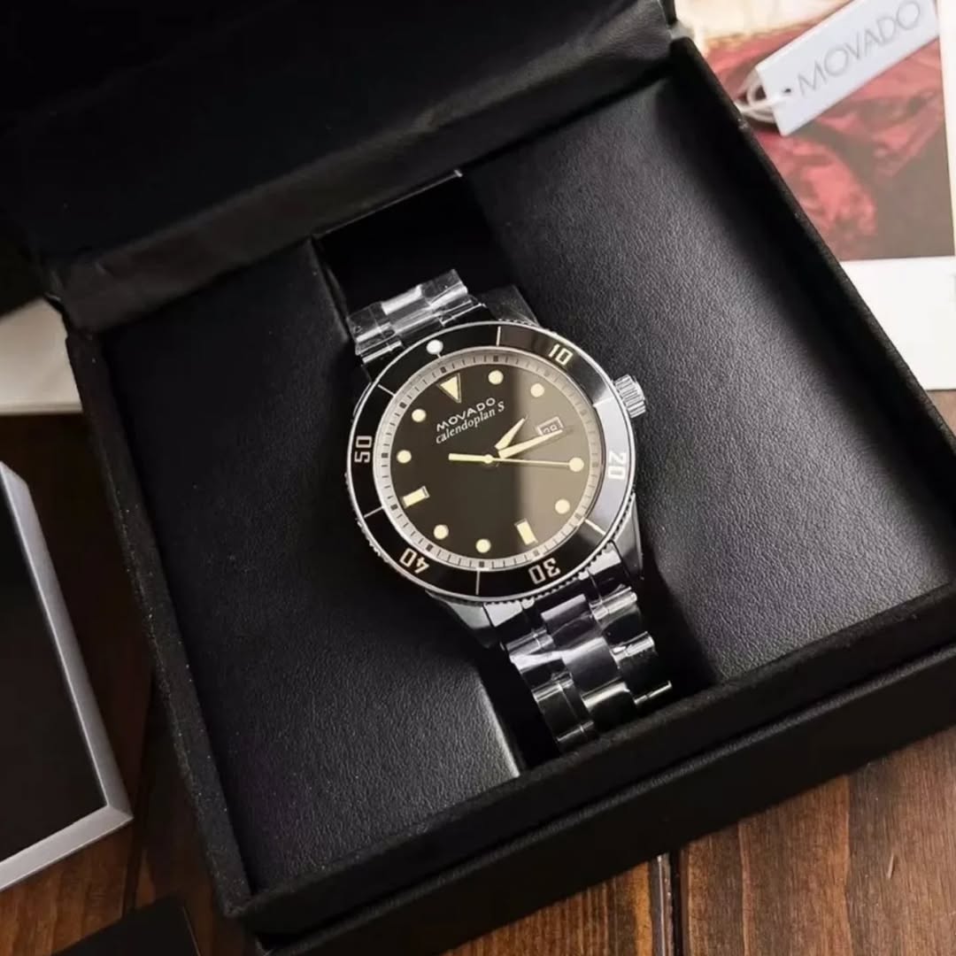 Movado Heritage men's watch in black presentation box with protective case and documentation