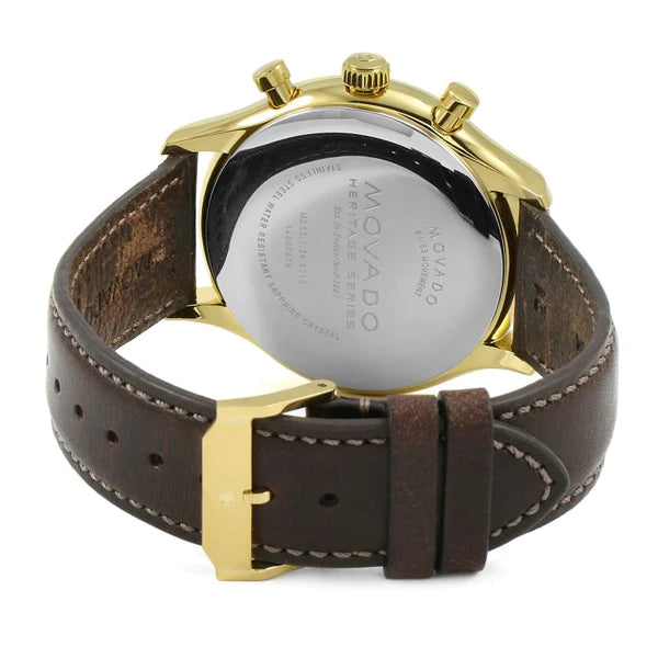 Rear view of Movado Heritage Chronograph with gold case, chronograph pushers, and leather strap