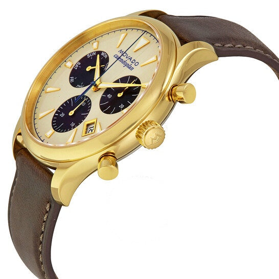 Side view of Movado Heritage Chronograph with gold case, chronograph pushers, and leather strap