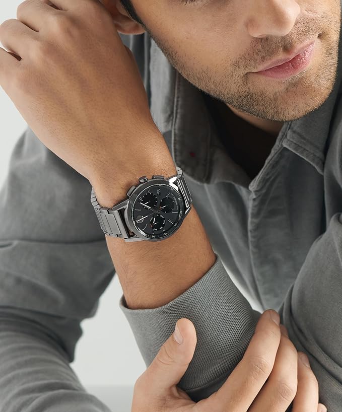 Movado Museum Sport Chronograph worn on wrist with black dial and steel bracelet