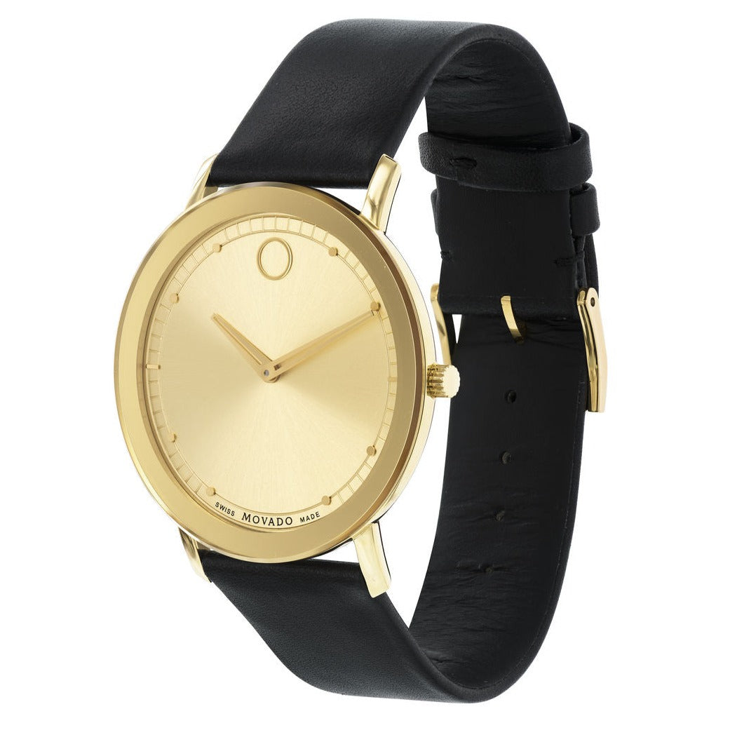 Movado Sapphire watch from side angle showing gold case and black leather strap detail