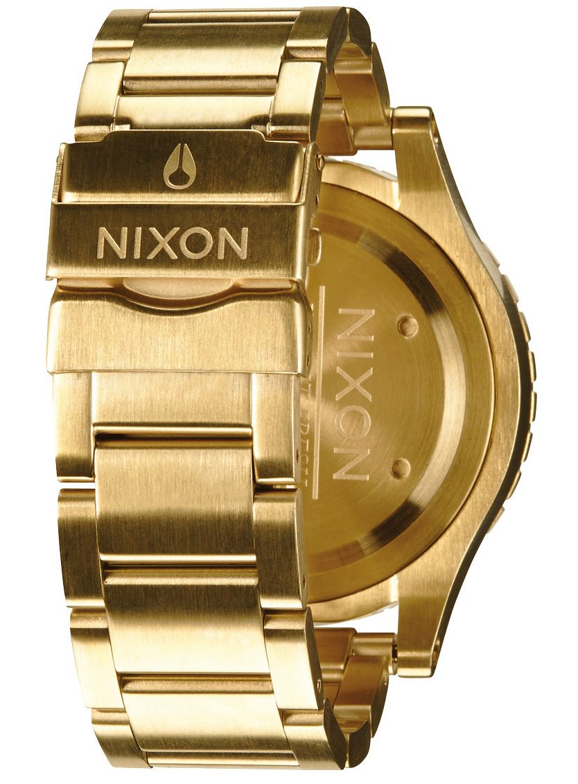 Nixon 48-20 Chrono caseback showing gold-tone stainless steel construction and bracelet