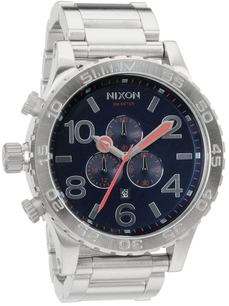 Nixon 51-30 chronograph watch with navy blue dial, silver case and bracelet, red accents