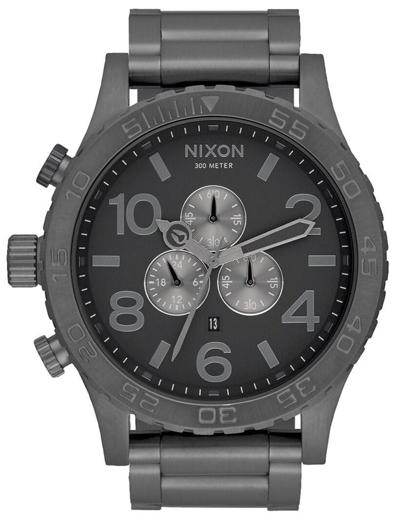 Nixon 51-30 Chronograph gunmetal watch face with three subdials and Arabic numerals