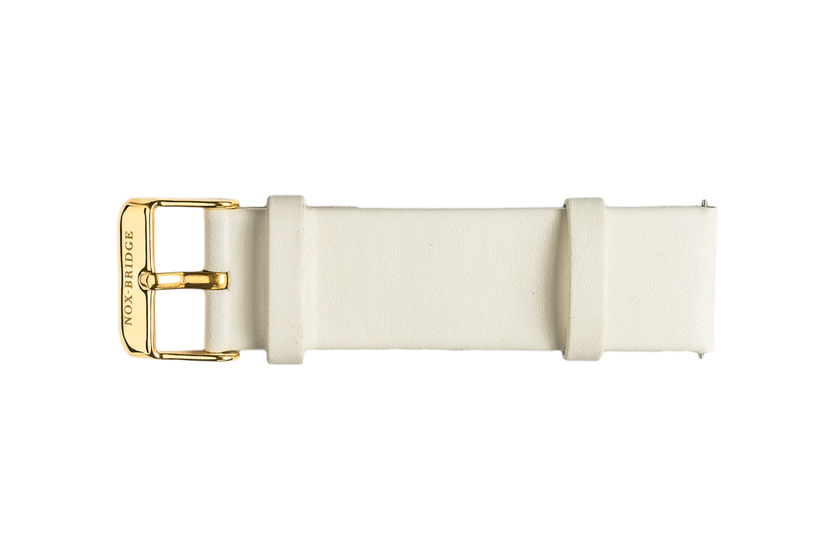 White vegan leather watch strap with gold-tone buckle and logo clasp