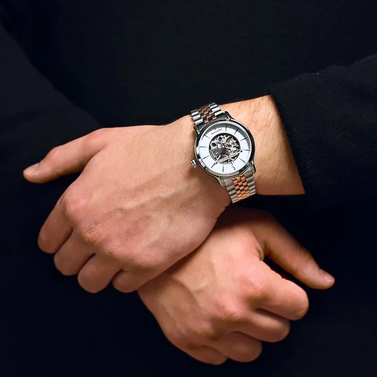 Maserati Epoca watch worn on wrist showing two-tone strap and white dial