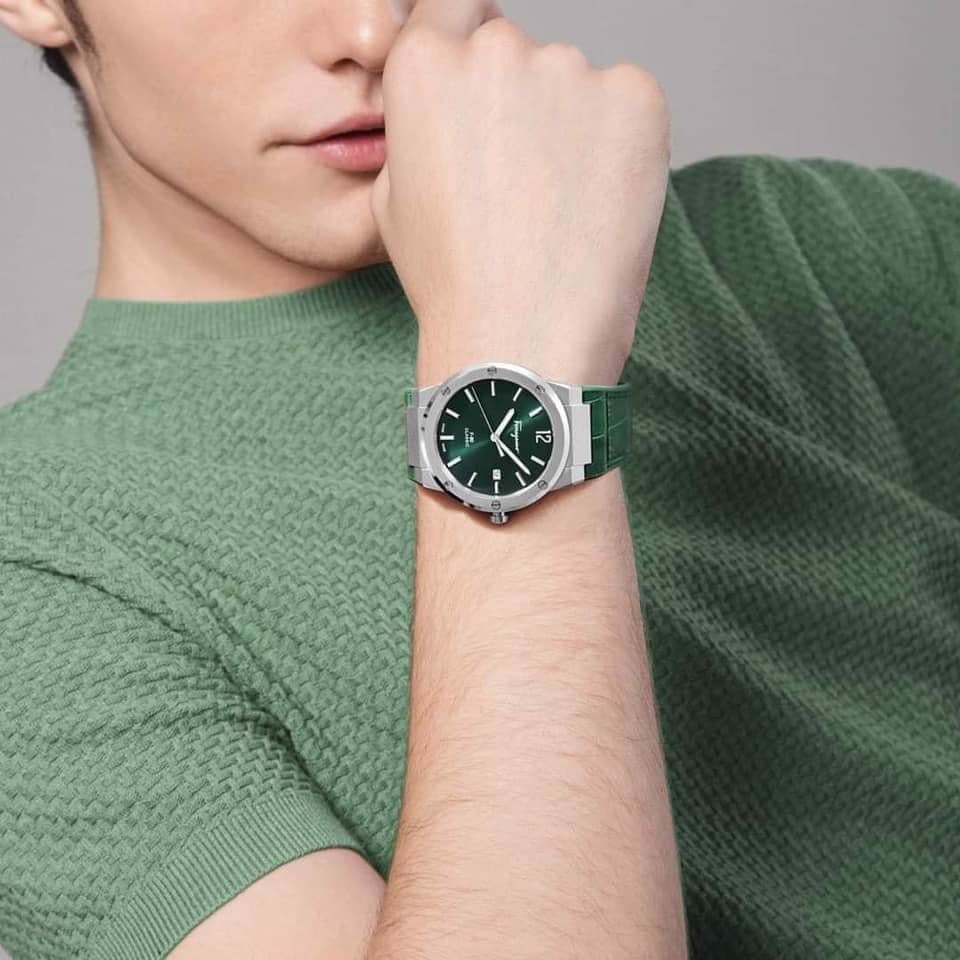 Salvatore Ferragamo F-80 Classic watch on wrist paired with green sweater