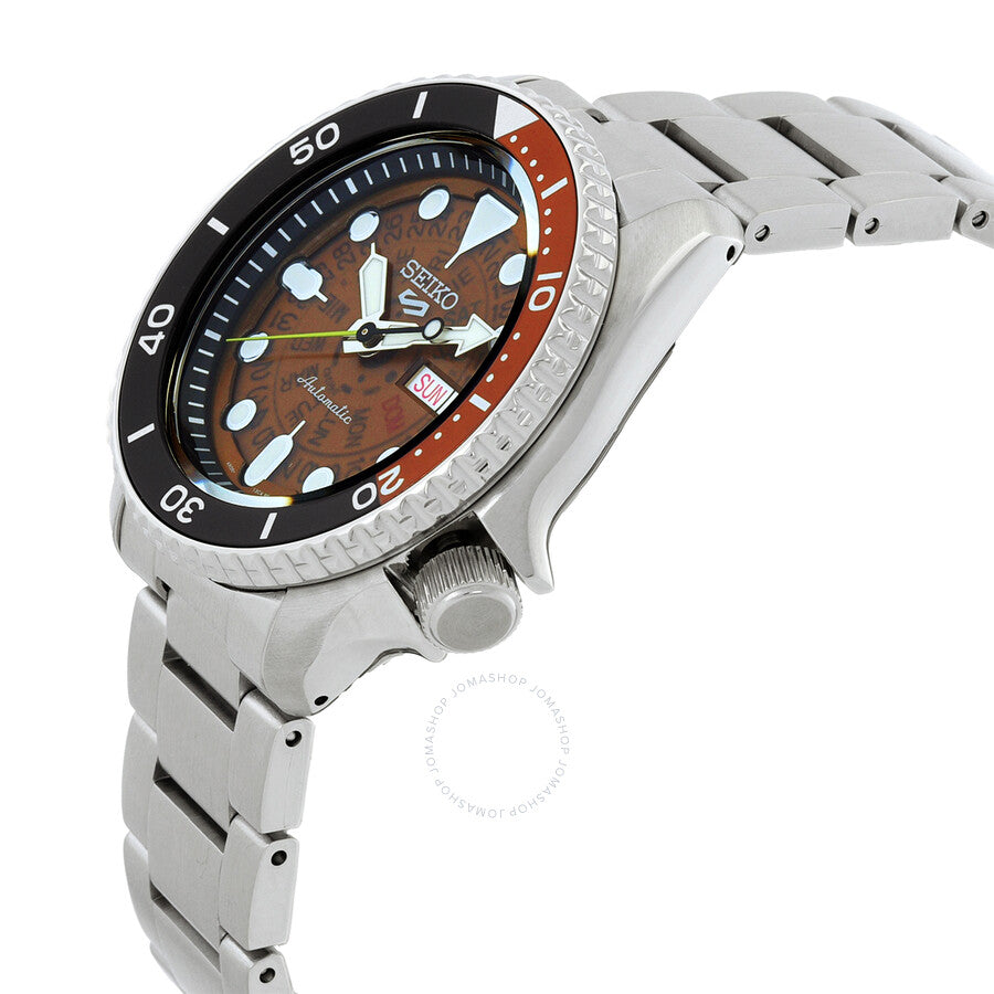 Seiko 5 Sports watch shown at angle with stainless steel three-link bracelet and brown dial visible