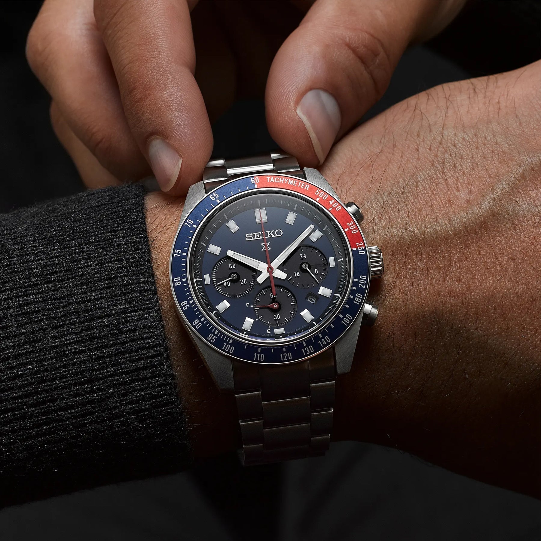 Seiko Pepsi Speedtimer silver chronograph watch on wrist showing dial and tachymeter bezel