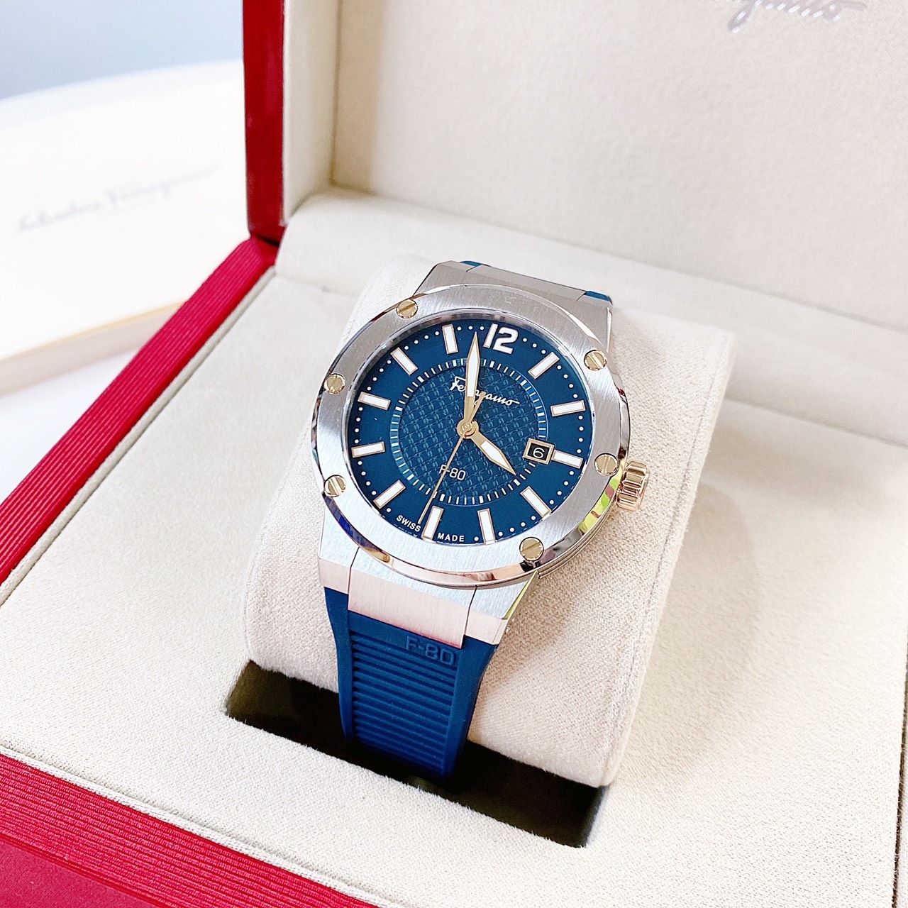 Ferragamo F-80 blue men's watch displayed in red branded presentation box