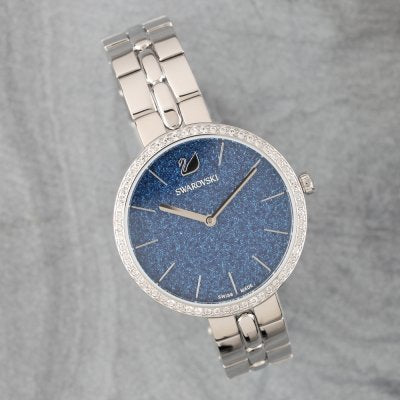 Overhead view of Swarovski Crystal Rose watch on silver steel bracelet