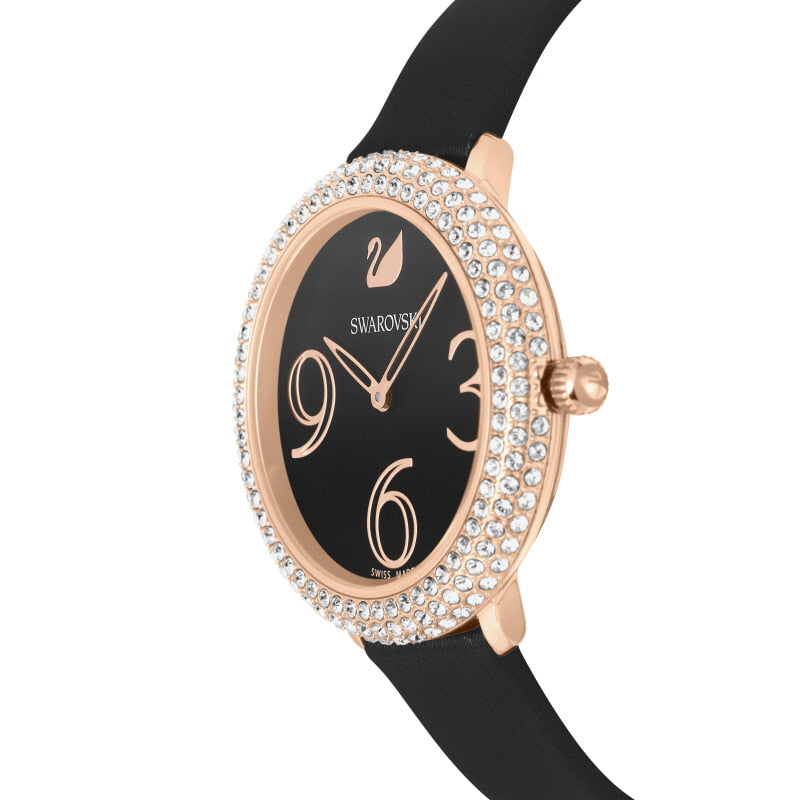 Side profile of Swarovski women's watch displaying rose gold case and black leather strap