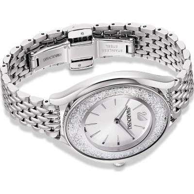 Swarovski Crystalline Aura silver-tone watch worn on wrist with crystal bezel detail