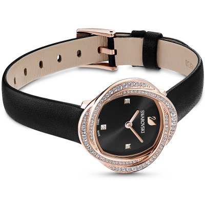 Swarovski Crystalline Aura women's watch worn on wrist showing black leather strap and dial