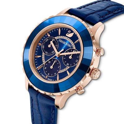 Swarovski Crystalline Glam chronograph with blue crystal bezel, blue dial, and rose gold tone case