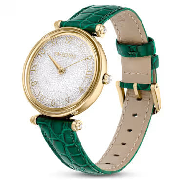 Three-quarter view of Crystalline Wonder watch showing green leather strap and beige suede interior