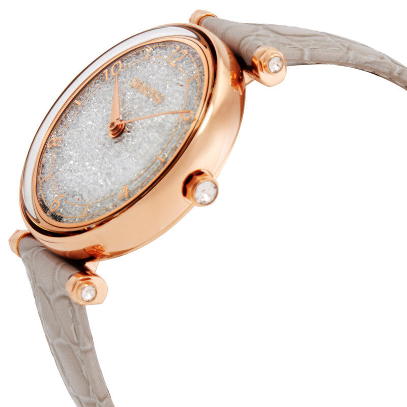 Angled side view of Swarovski Crystalline Wonder watch with rose gold case and crystal dial