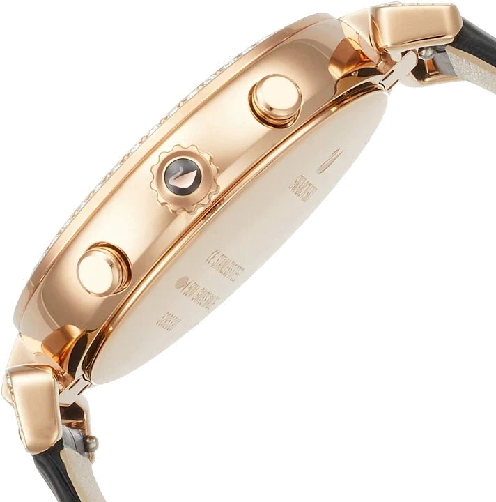 Swarovski Era Journey watch side view displaying rose gold case, chronograph pushers, and black leather strap