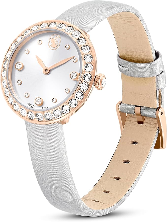 Angled view of Swarovski Matrix Tennis watch showing rose gold case and white leather strap detail