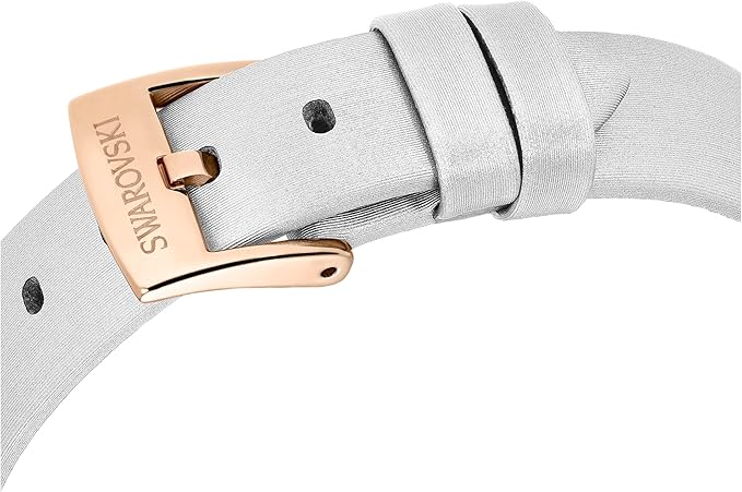 Close-up of Swarovski Matrix Tennis watch white leather strap with rose gold buckle