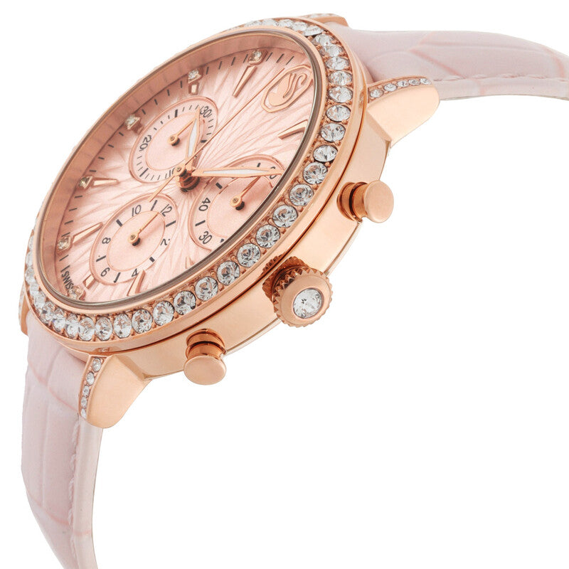 Side angle view of Swarovski Matrix Tennis watch showing rose gold case, crystal bezel, and chronograph subdials