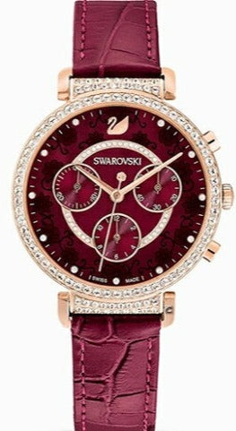 Front view of purple dial chronograph watch with octagon crystal, gold-tone case, and crystal bezel