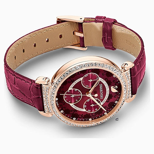 Octagon cut chronograph watch on wrist showing purple dial, champagne gold case, crystal bezel, and burgundy leather bracelet