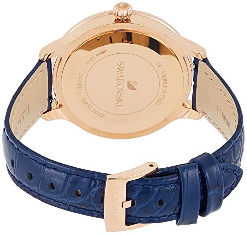 Caseback of Swarovski Octea Lux showing rose gold case and blue crocodile-textured leather