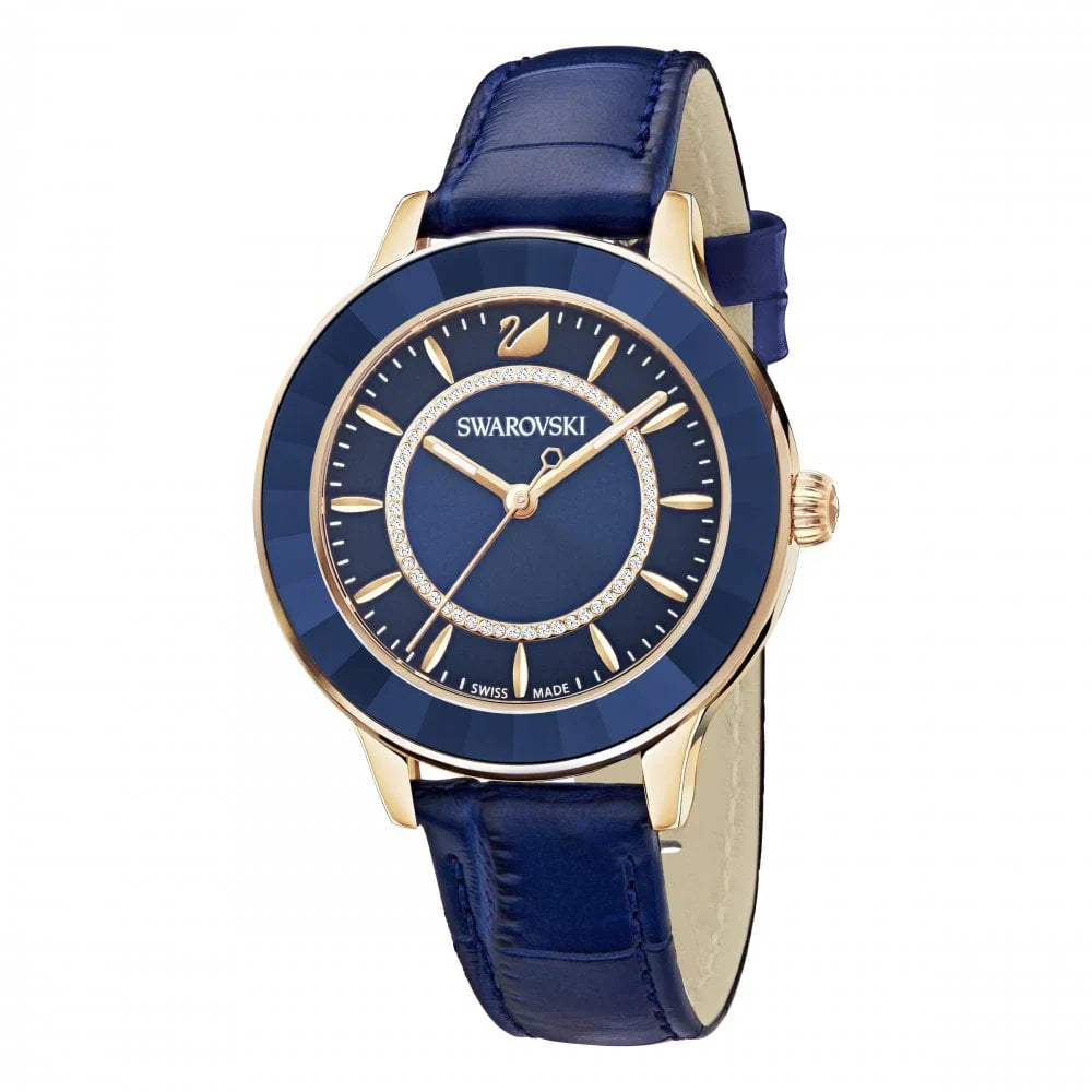 Swarovski Octea Lux watch featuring blue dial with Roman numerals and rose gold accents