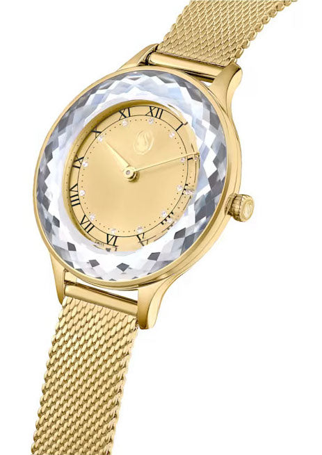 Side view of Swarovski Octea Nova watch with gold mesh strap and sapphire faceted bezel