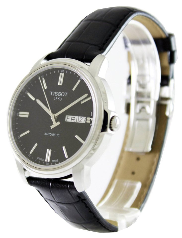 Tissot Automatics III watch worn on wrist showing case profile and black leather strap