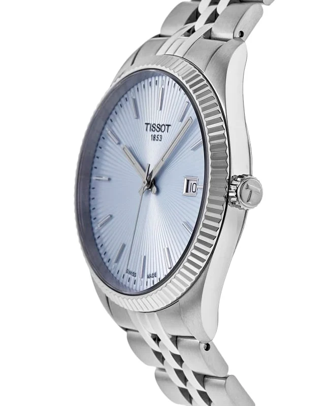 Tissot Ballade watch angled view showing fluted bezel and stainless steel bracelet