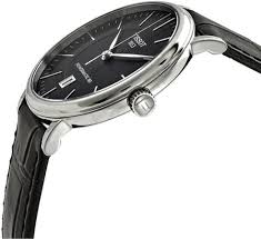 Side view of Tissot Carson Automatic showing case profile and black leather strap