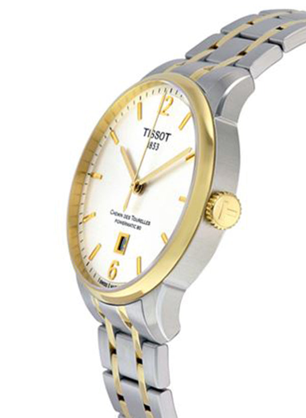 Two-tone Tissot watch displayed at angle showing case, two-tone bracelet, and dial details