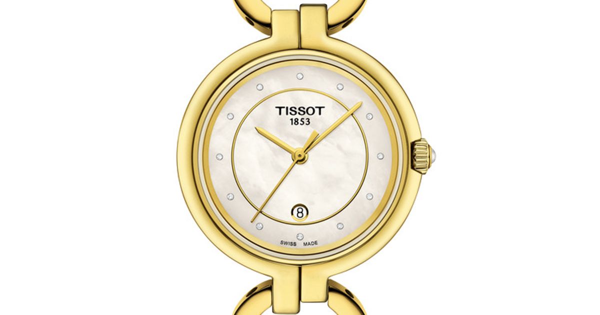 Angled view of Tissot Flamingo women's watch showing dial and gold-tone bracelet