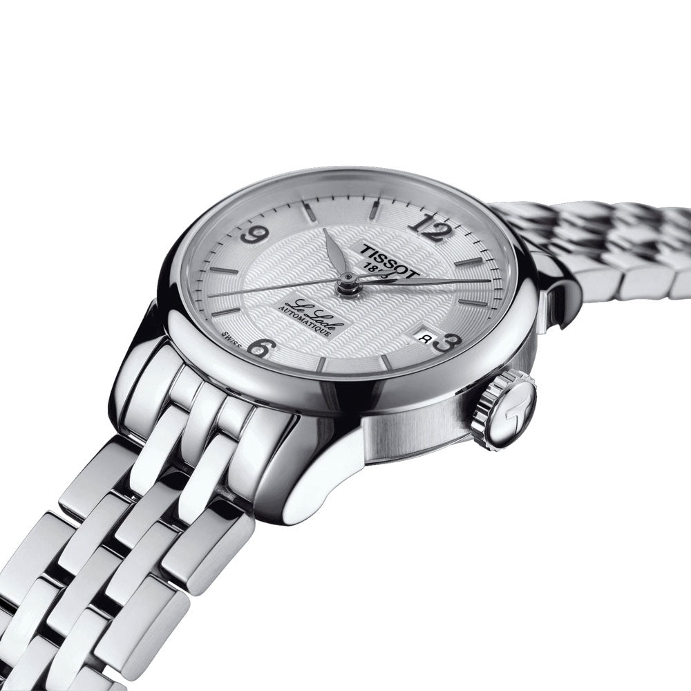Tissot Le Locle Small Lady automatic watch on wrist showing silver case and steel bracelet