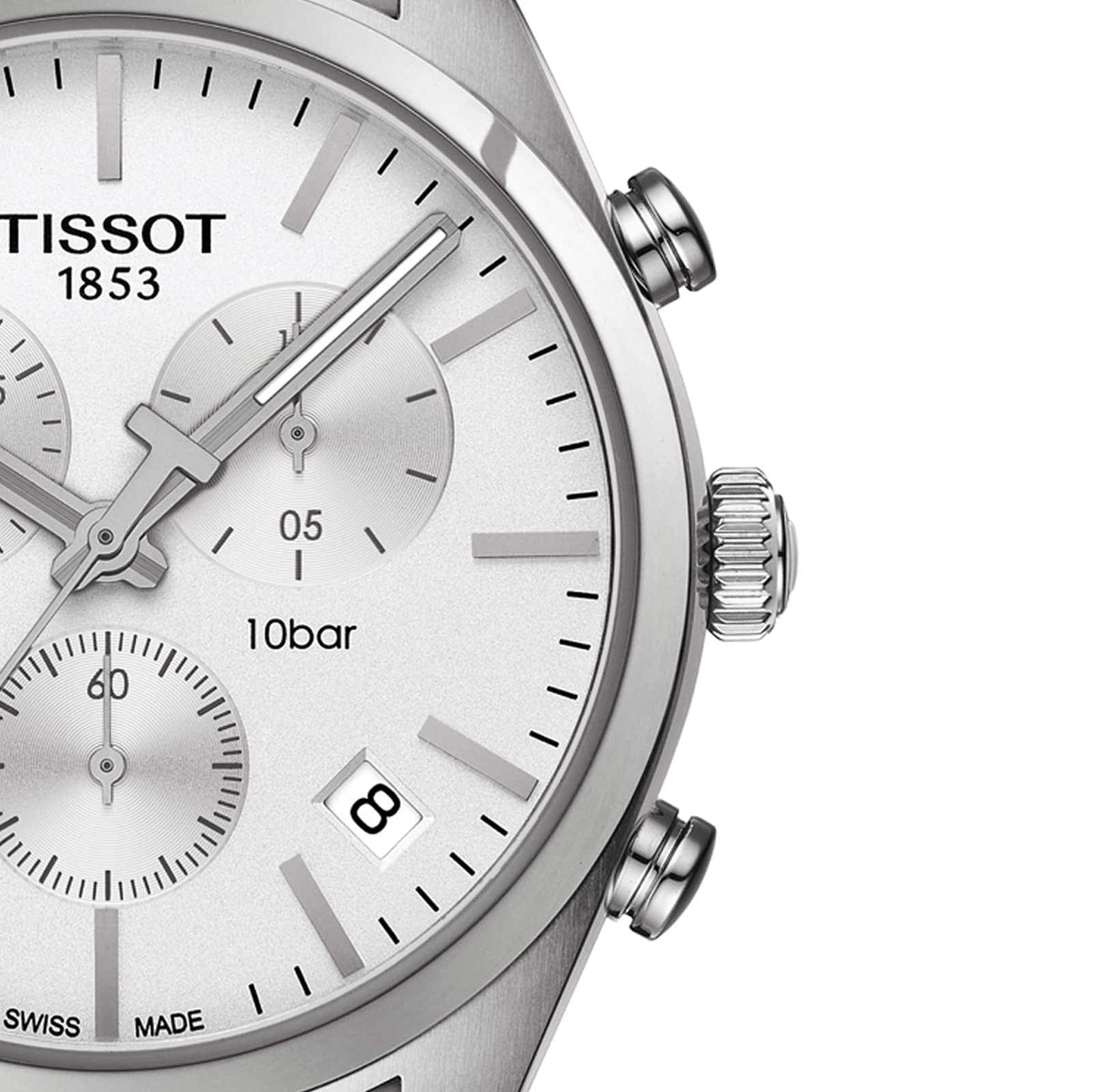 Close-up of Tissot PR 100 white dial showing chronograph subdials and 10bar rating