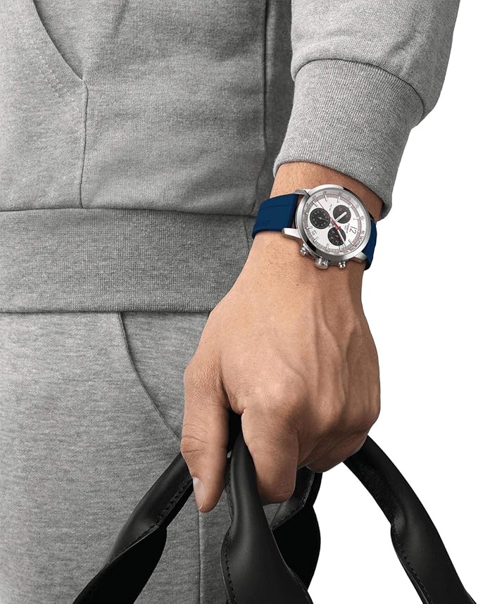 Tissot PRC 200 IIHF chronograph worn on wrist showing silver dial and blue strap