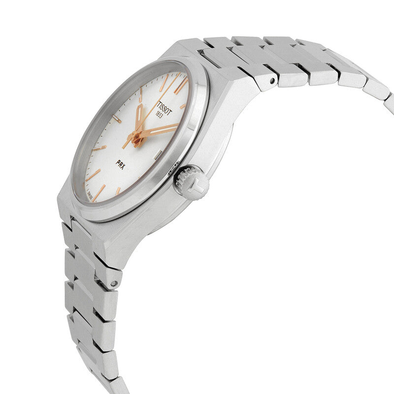 Side angle view of Tissot PRX showing stainless steel integrated bracelet and silver dial