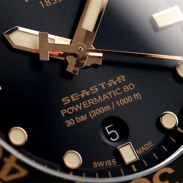 Seastar Powermatic 80 dial detail showing 30 bar water resistance, Swiss made, and applied indices