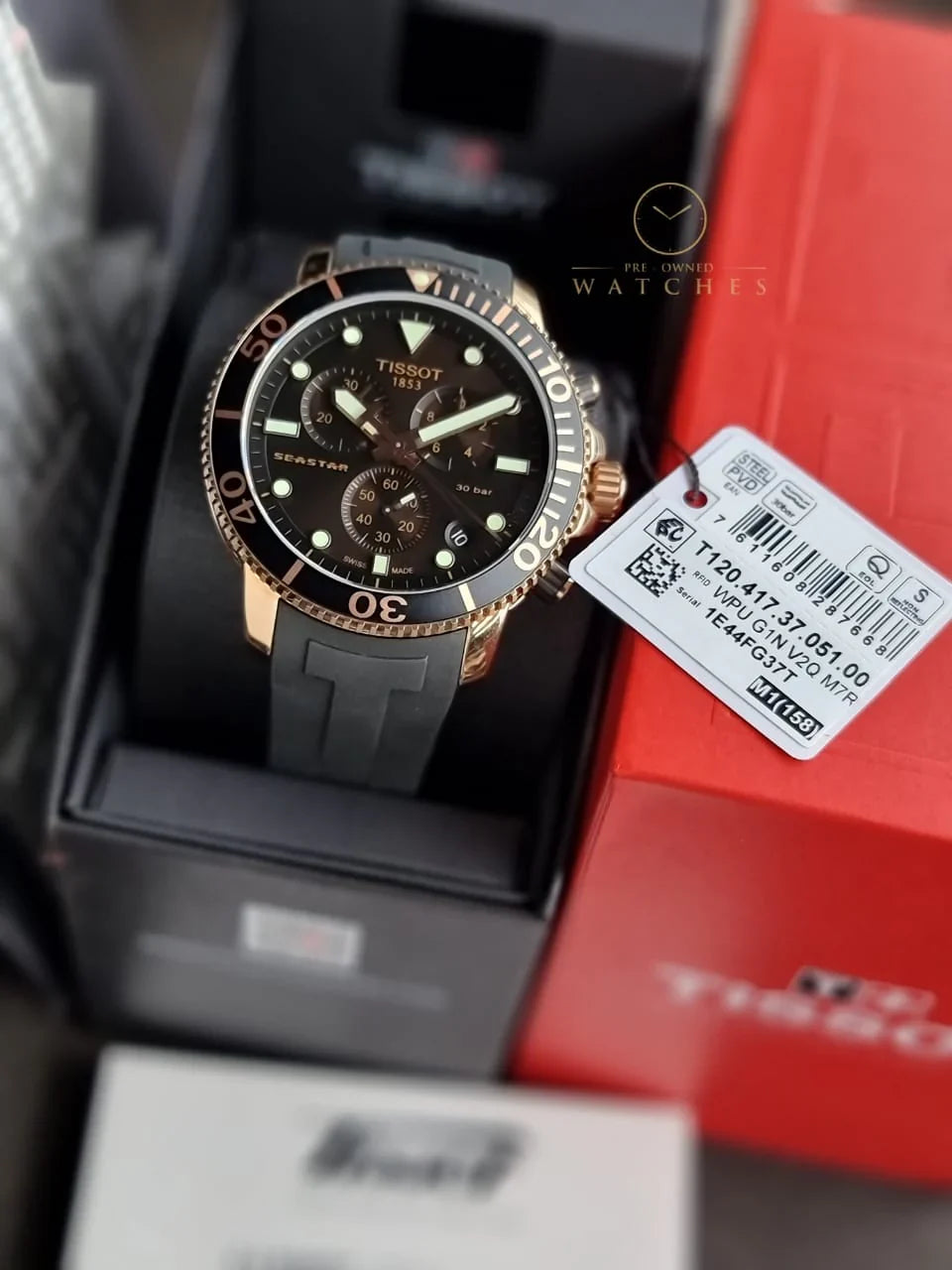 Tissot Seastar T-Sport watch in box with authentication card and red Tissot packaging