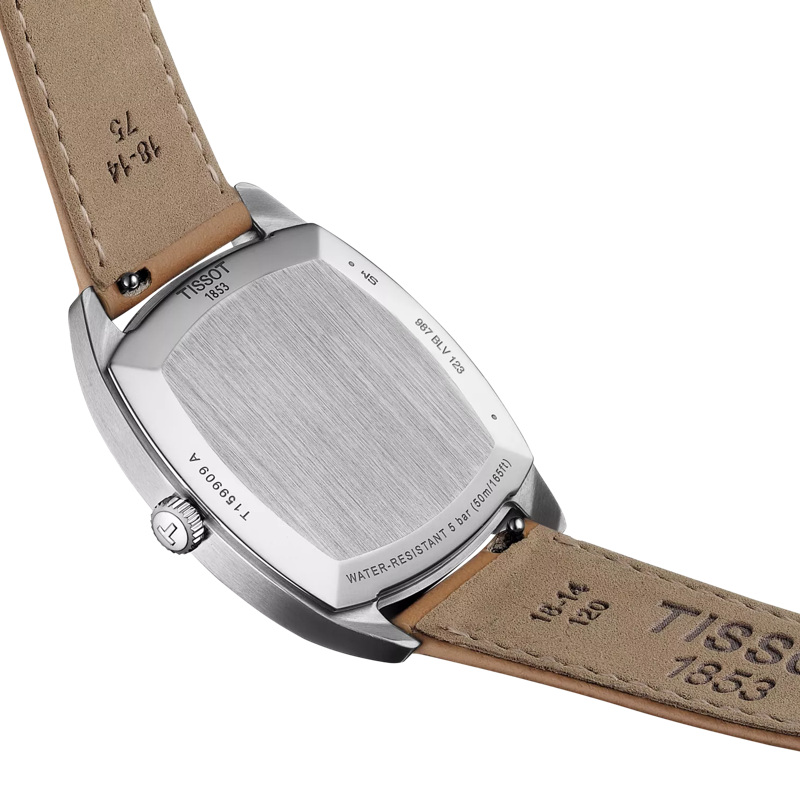 Tissot Stylist caseback showing water resistance and movement details on brown strap