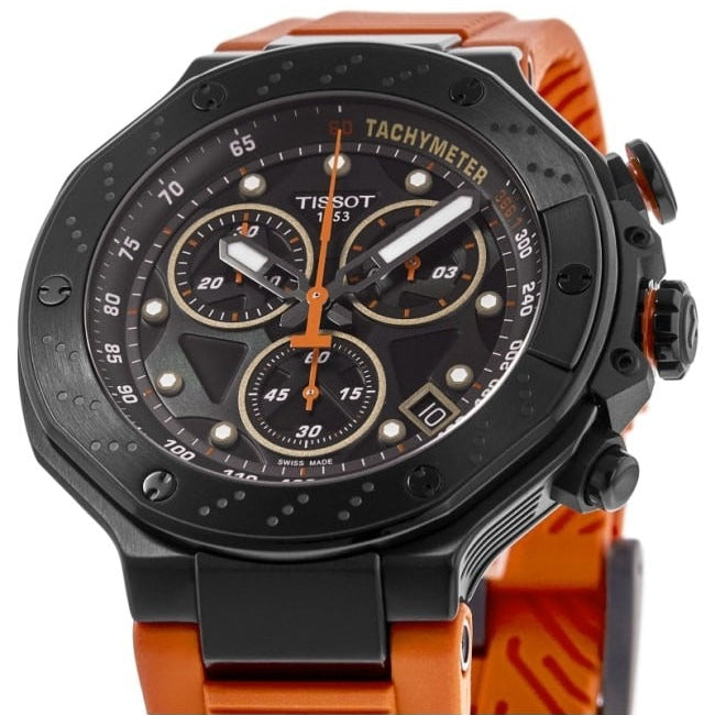 Angled view of Tissot T-Race watch showing black case, orange strap, and chronograph subdials