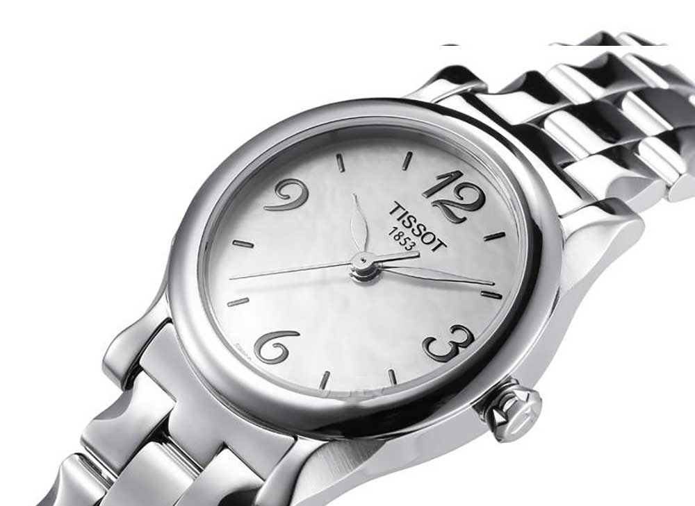 Close-up detail of Tissot T028.210.11.037.00 dial with Arabic numerals and silver hands