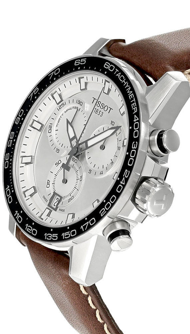 Tissot chronograph watch side profile showing stainless steel case and brown strap