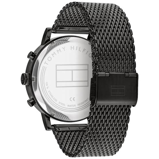 Tommy Hilfiger watch caseback showing metal mesh strap and case engraving