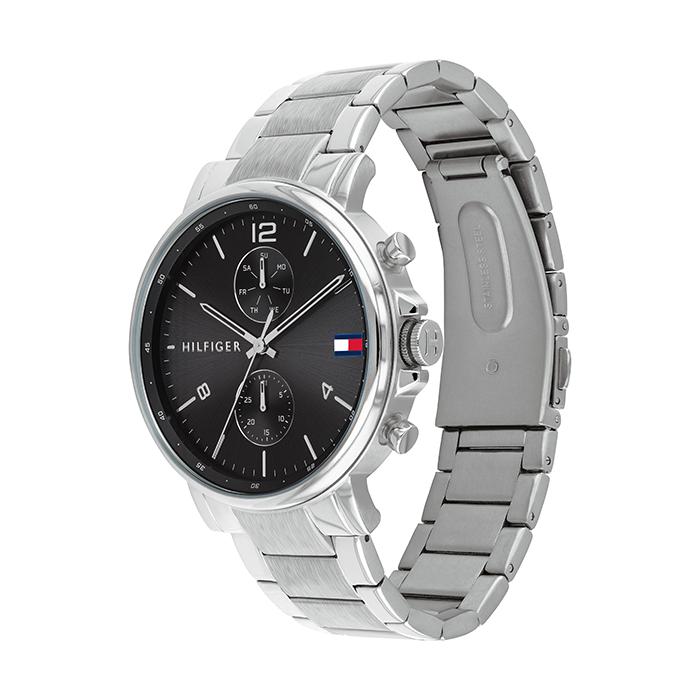 Tommy Hilfiger 1710413 chronograph watch shown from angle with black dial and metal band