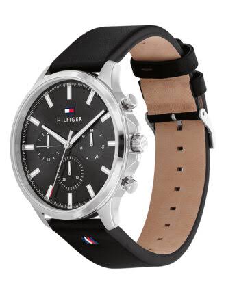 Side view of Tommy Hilfiger chronograph watch showing black leather and tan suede strap detail